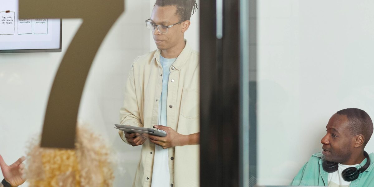 A creative team collaborating, demonstrating the seamless integration of AI photography tools into their daily workflow for efficient visual content creation.