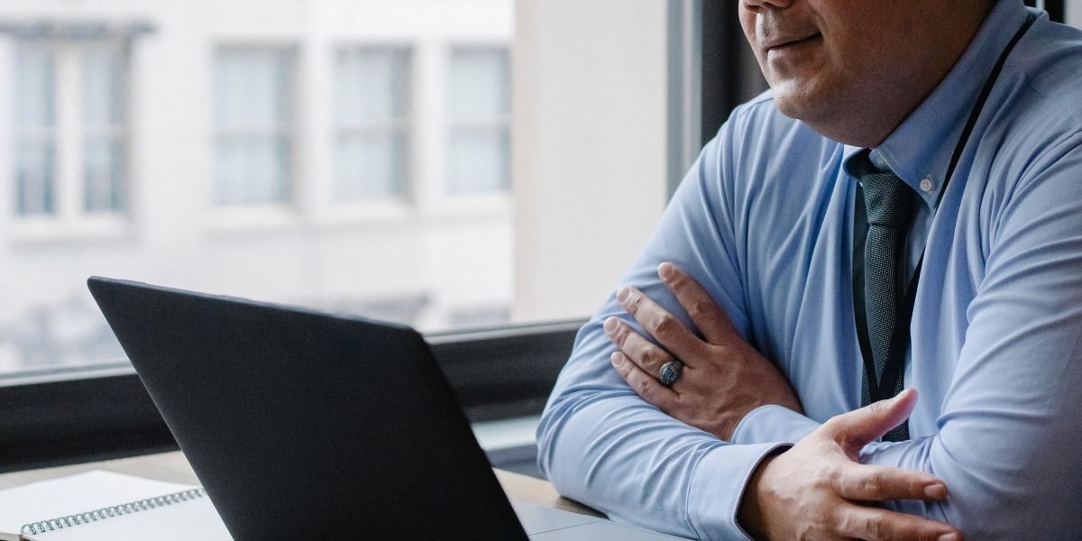 A business leader engaged in deep thought, reflecting on strategic decisions in the rapidly evolving AI landscape.