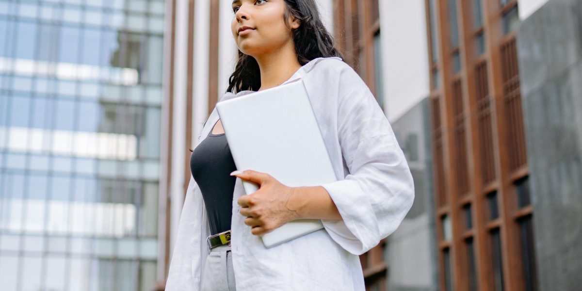 A person looking confidently towards the future, symbolizing successful adaptation to career changes.