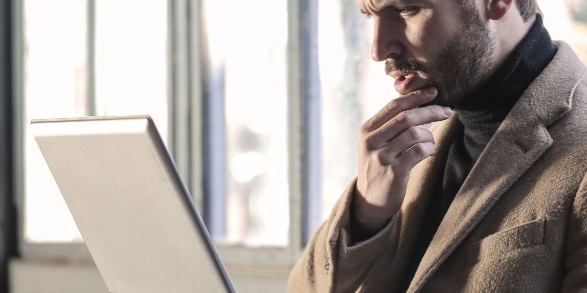 A person deeply contemplating complex ideas, symbolizing the challenge of defining technology clearly.