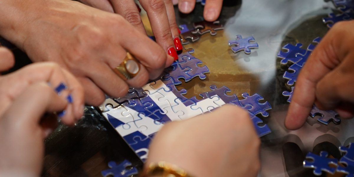 A team or individual engaged in hands-on problem-solving, reflecting practical application of deep learning.