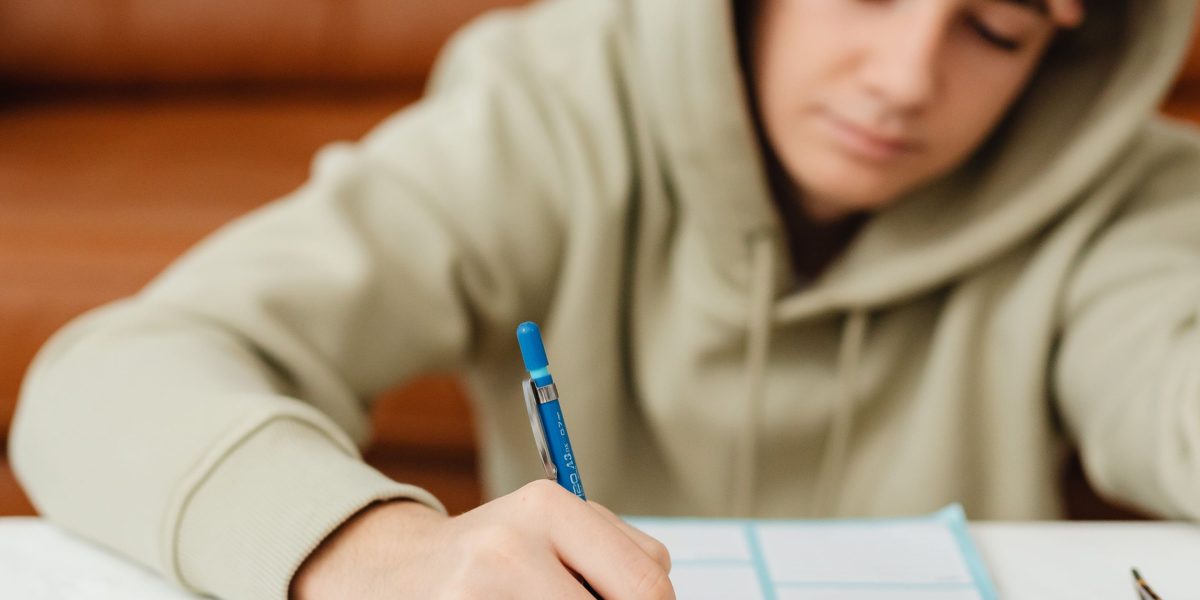 A person focused on abstract concepts or complex theories, representing the theoretical depth of the Stanford CS229 course.