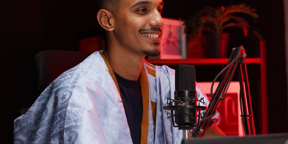 A podcaster utilizing AI voice generation to create engaging content, streamlining production workflows and expanding reach.