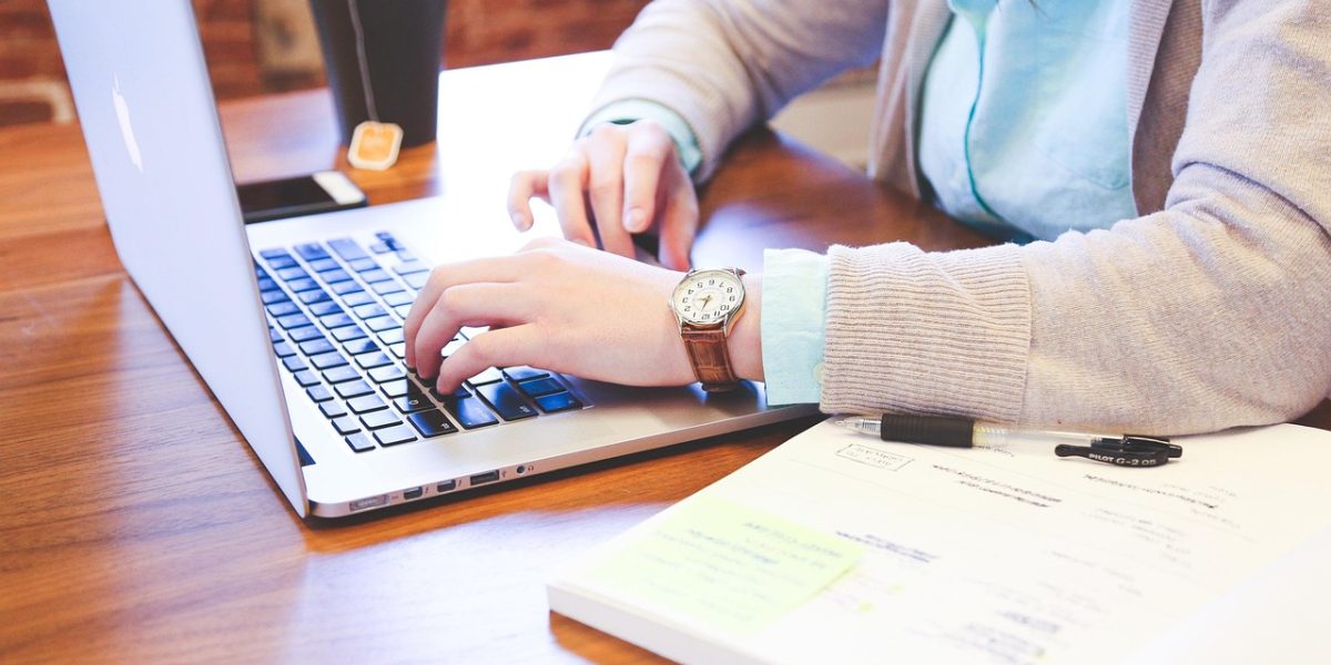 Individual thoughtfully processing complex information to gain clarity on a subject.