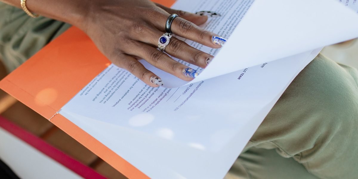 A professional carefully reviewing course material or documents.