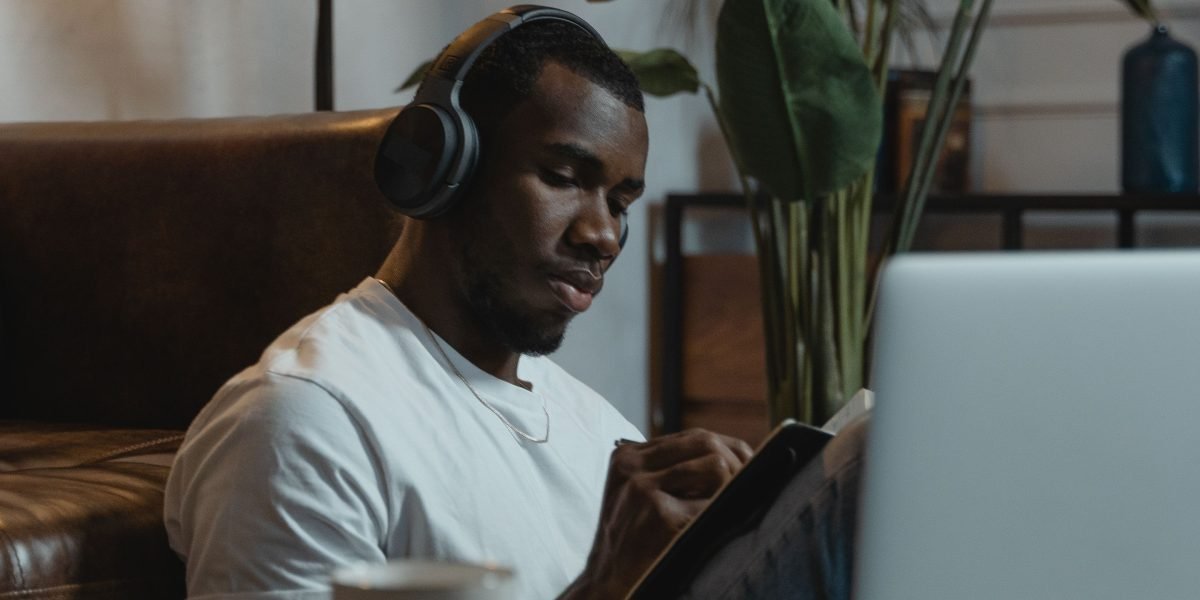 An engineer actively engaged in learning new skills through an online course to master AI agent development.