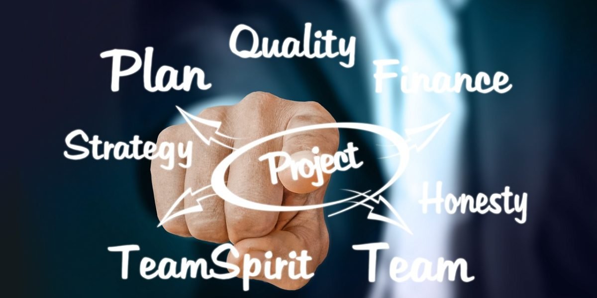 A diverse team actively collaborating in a meeting, representing the adoption of AI to create real-world business value.