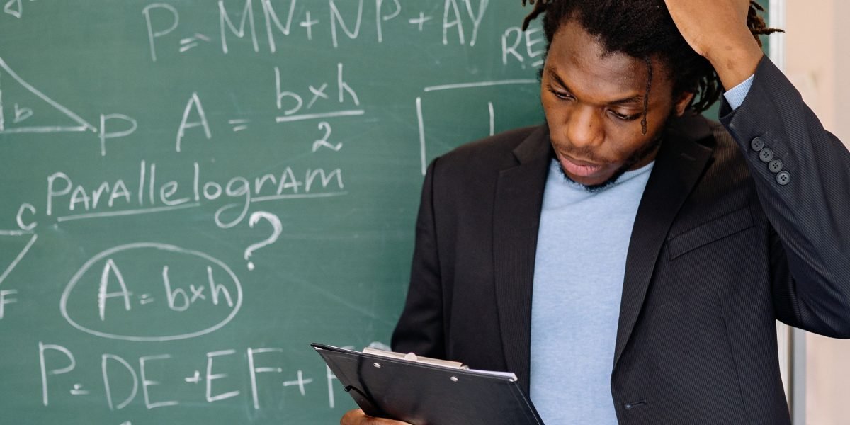An individual thoughtfully considering various educational paths and career goals for AI learning.