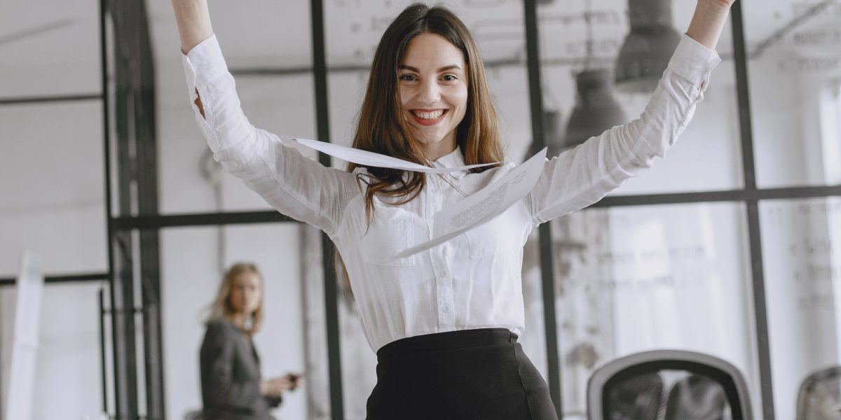 Celebrating a successful career milestone, such as a job offer or promotion.