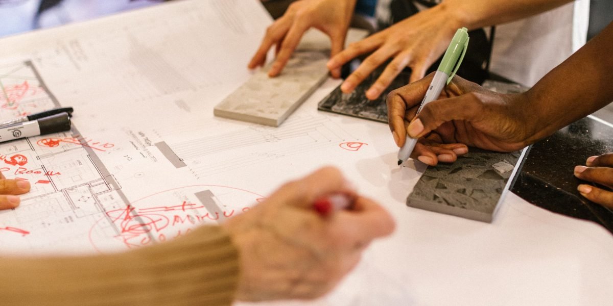 A team actively planning and outlining a new project roadmap, symbolizing strategic implementation.