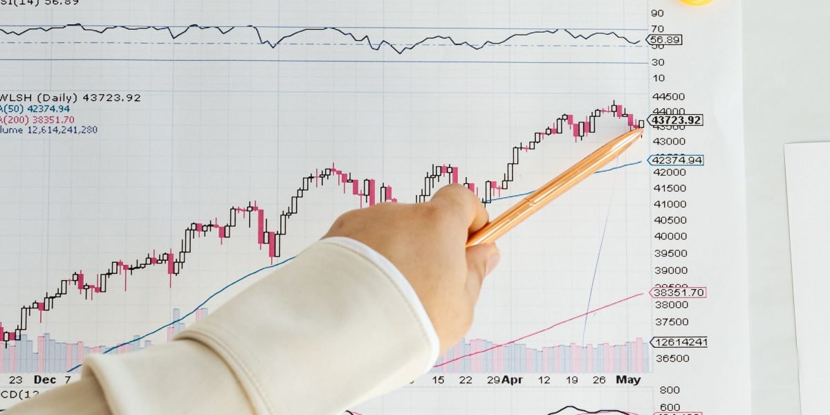 A professional examines data visualizations to quickly identify patterns and potential issues within a dataset.